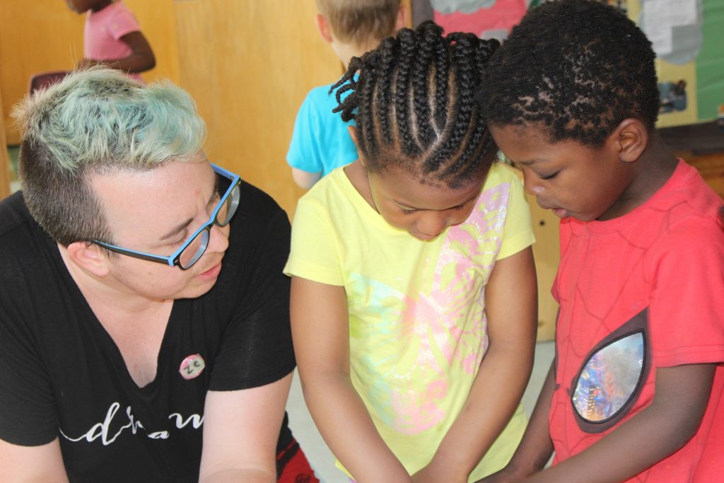 Educator playing with children